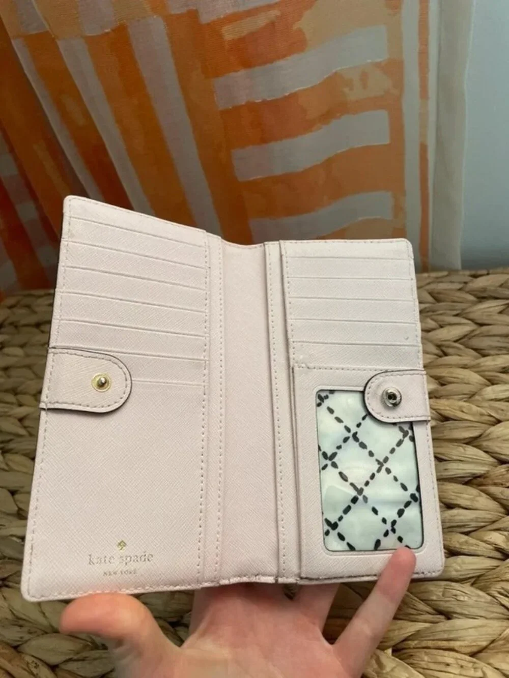 kate spade light pink saffiano continental wallet with gold logo